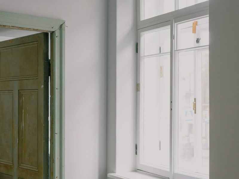 Spacious, clean room with natural light suitable for home workouts.